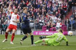 爱游戏官网-拜仁慕尼黑全队配合默契，多次破门得分